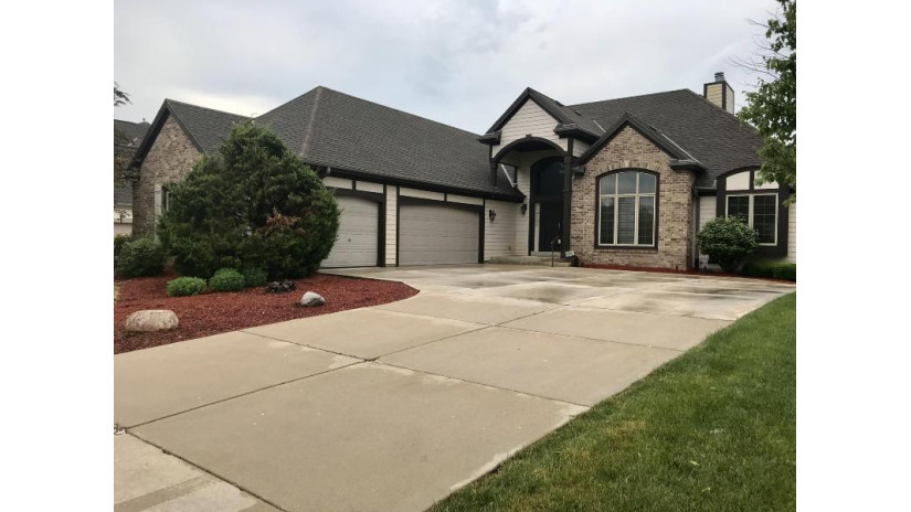 W173N5328 Ravenwood Dr Menomonee Falls, WI 53051 by HomeWire Realty $589,000