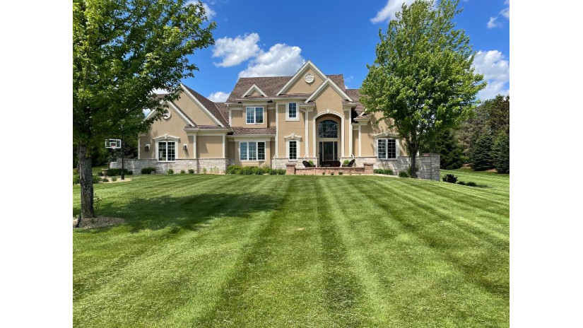 2180 Coachmen Ct Delafield, WI 53018 by The Realty Company, LLC $1,050,000