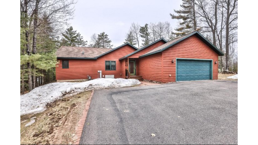 7193 Silver Lake Rd Hazelhurst, WI 54531 by RE/MAX United - West Bend $499,900