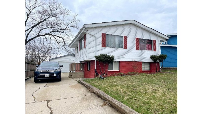 5667 N 73rd St Milwaukee, WI 53218 by Homestead Realty, Inc $195,000