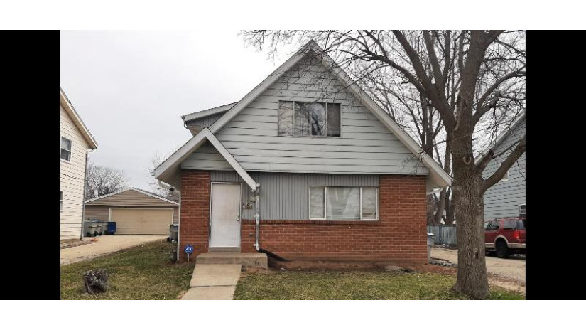 9142 N 95th St Milwaukee, WI 53224 by Homestead Realty, Inc $119,000