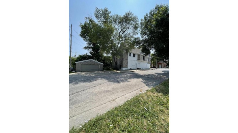 1554 N 33rd St 1556 Milwaukee, WI 53208 by Acquire Realty LLC $199,900