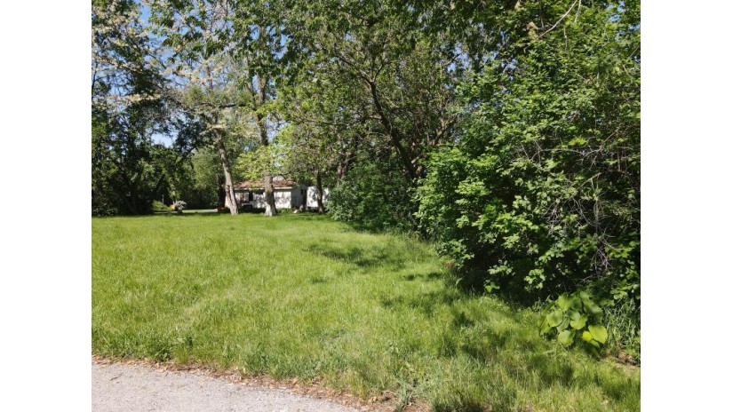 325 W Park St Salem Lakes, WI 53170 by Bear Realty, Inc $60,500