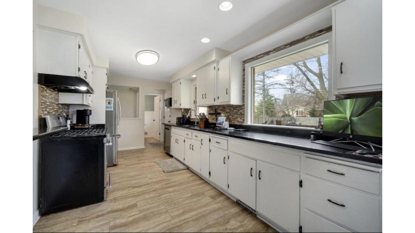 12040 W Walnut Rd Wauwatosa, WI 53226 by EXP Realty, LLC~MKE $440,000