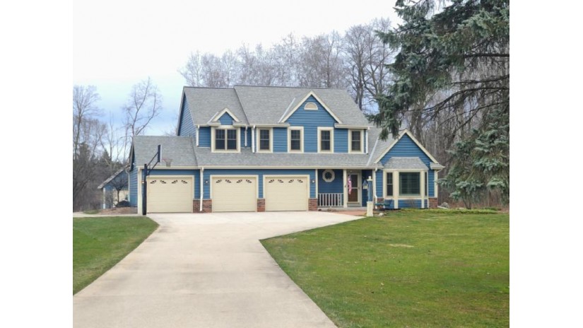 1606 Edgewater Ct Grafton, WI 53024 by Schmit Realty, Inc $649,900