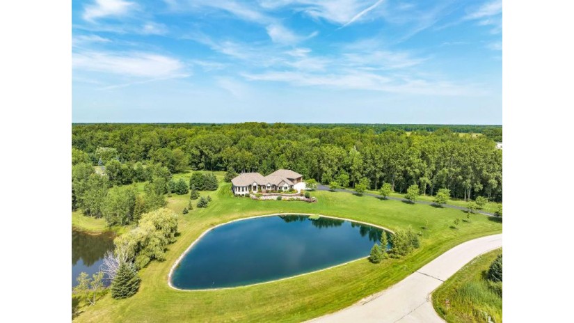 5858 Wood Brook Circle Little Suamico, WI 54141 by Coldwell Banker Real Estate Group $1,299,000