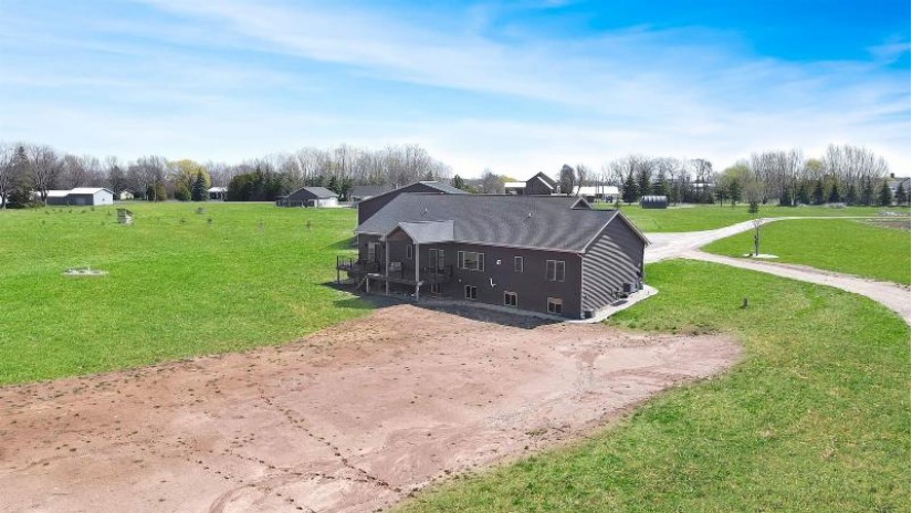 6161 Woodenshoe Road Vinland, WI 54956 by Coldwell Banker Real Estate Group $950,000