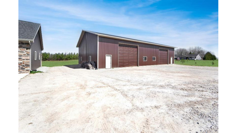 6161 Woodenshoe Road Vinland, WI 54956 by Coldwell Banker Real Estate Group $950,000