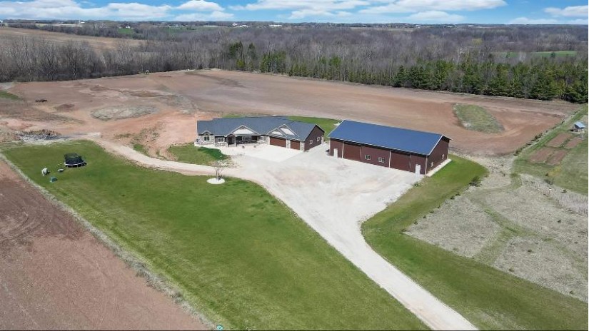 6161 Woodenshoe Road Vinland, WI 54956 by Coldwell Banker Real Estate Group $950,000