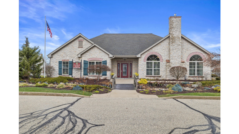 N68W15497 Tartan Cir 327 Menomonee Falls, WI 53051 by Shorewest Realtors $399,900