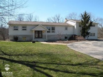 785 Getman Owosso, MI 48867