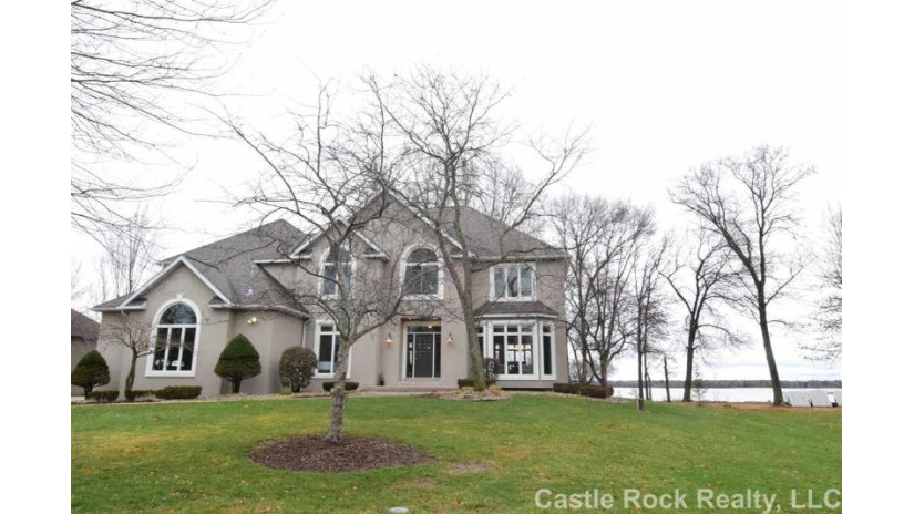 N7780 Half Moon Bay Dr E Germantown, WI 53950 by Castle Rock Realty Llc $780,000