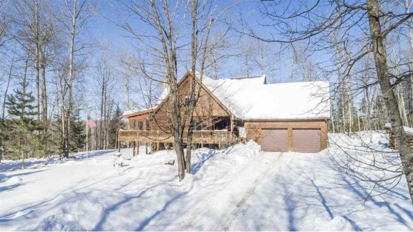 W1372 Hannahs Lane Wolf River, WI 54491 by Todd Wiese Homeselling System, Inc. $399,900