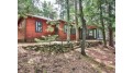 1129 Wooded Ln Eagle River, WI 54521 by Re/Max Property Pros $630,000