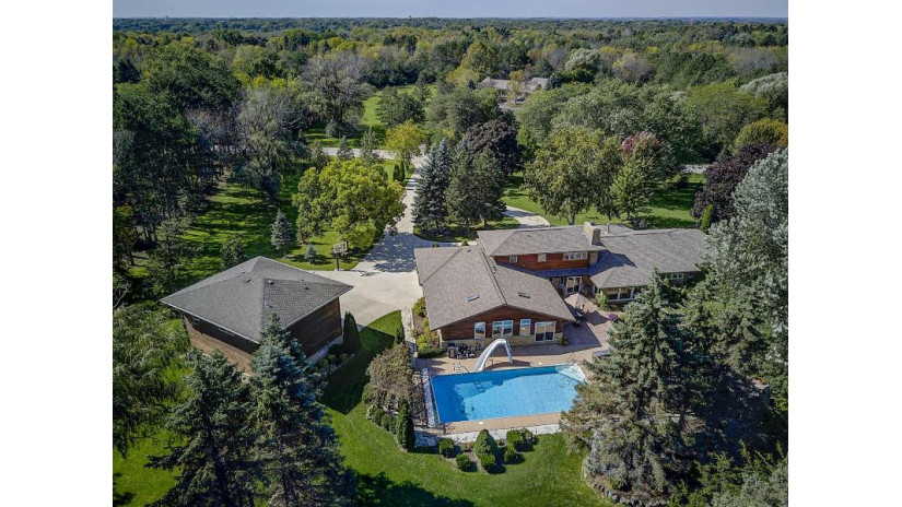 7550 N Pheasant Ln River Hills, WI 53217 by First Weber Inc - Menomonee Falls $749,900