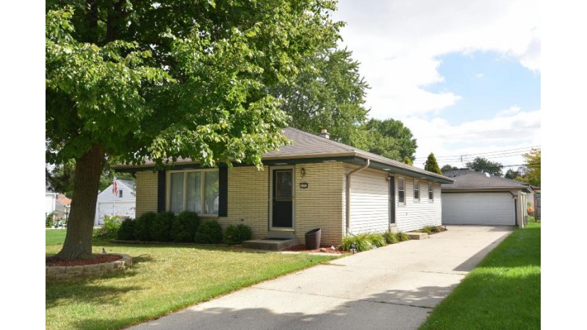 4242 S 91st Pl Greenfield, WI 53228 by Powers Realty Group $205,000