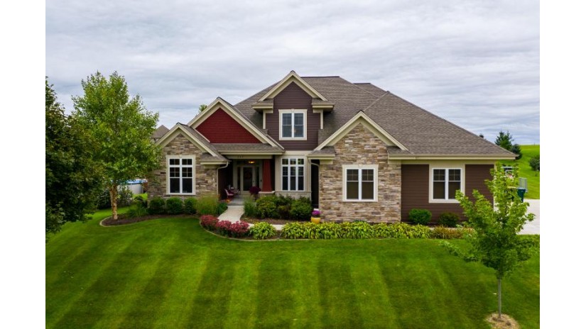 217 Hunters Xing N Slinger, WI 53086 by RE/MAX Insight $699,000