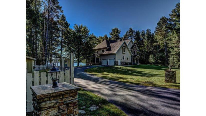 3555 Shangri La Rd Eagle River, WI 54521 by Re/Max Property Pros $575,000