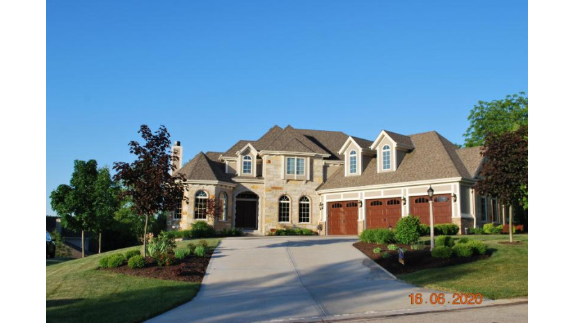 N55W21175 Logan Dr Menomonee Falls, WI 53051 by Design Realty, LLC $848,888