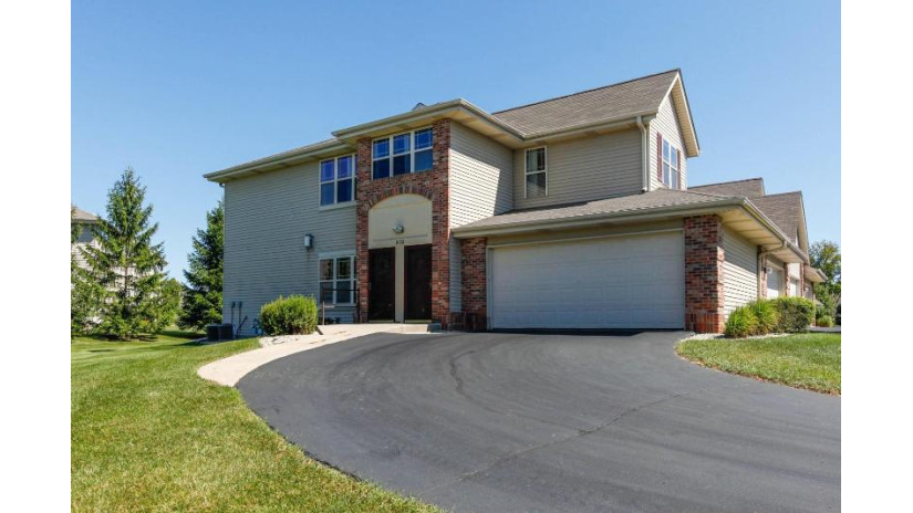 1022 E Woodview Ct 2 Slinger, WI 53086 by Froemming Realty LLC $189,900