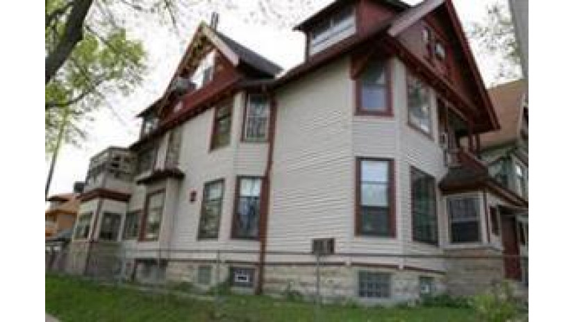 2301 W Mckinley Blvd Milwaukee, WI 53205 by Badger Realty Team-Cottage Grove $139,900