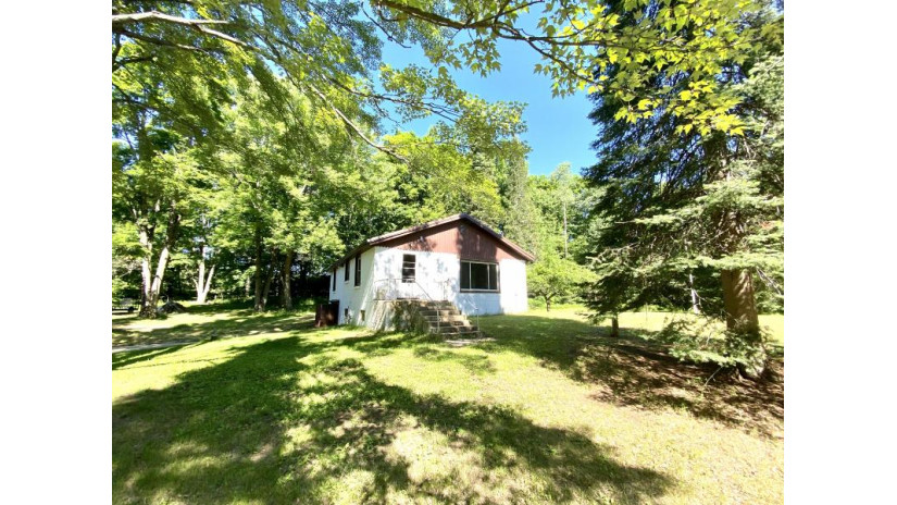 N8719 Pines Rd Middle Inlet, WI 54177 by Bigwoods Realty Inc $69,900