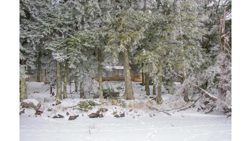7522 Columbus Highlands Ln Sugar Camp, WI 54521 by Re/Max Property Pros $97,500