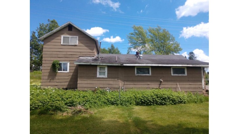 8287 Main St Presque Isle, WI 54557 by Headwaters Real Estate $64,900