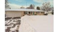 11841 W Woodside Dr Hales Corners, WI 53130 by RE/MAX United - West Bend $349,900