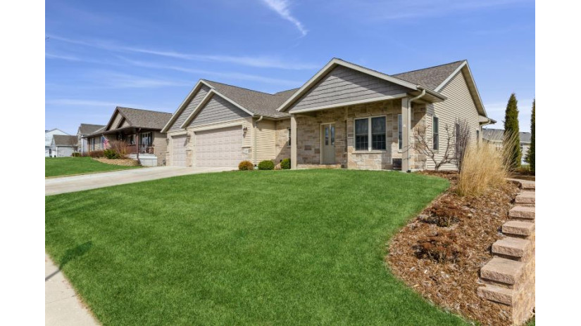 610 Ne Shna Bek Trl Kewaskum, WI 53040 by Coldwell Banker Realty $399,900