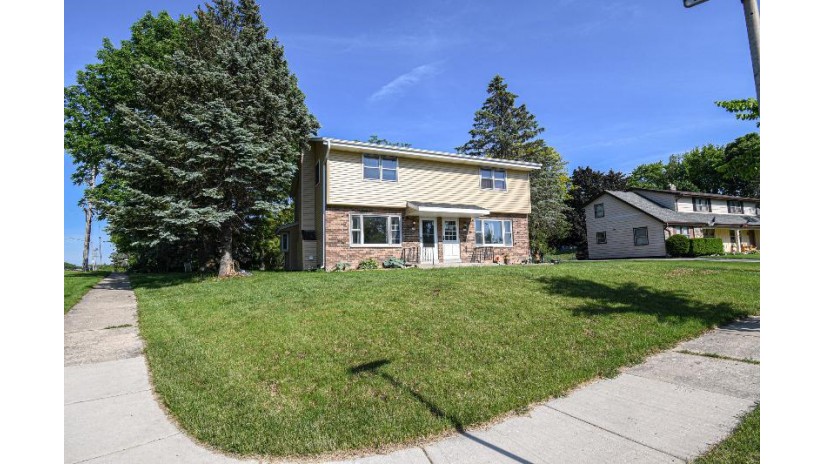 101 Madison Ct 103 Waukesha, WI 53188 by Redefined Realty Advisors LLC $334,900