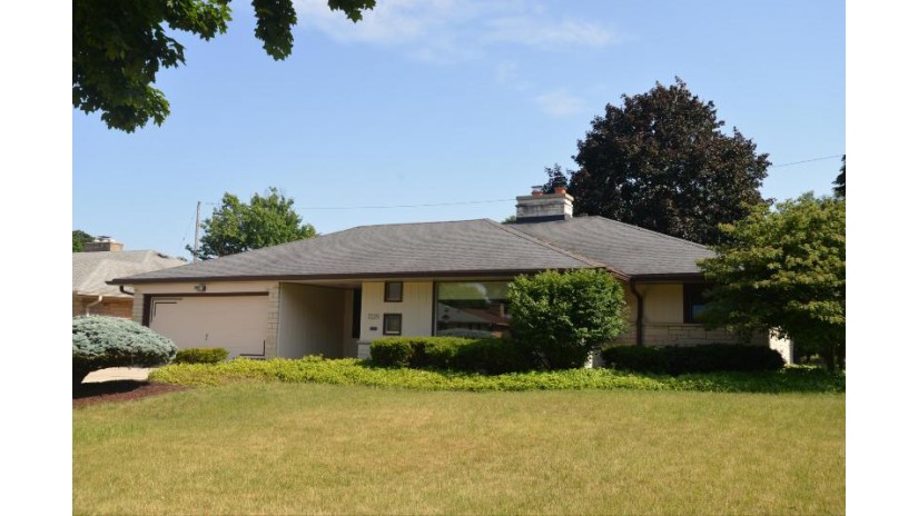 7225 W Wells St Wauwatosa, WI 53213 by RE/MAX Realty Center $384,900