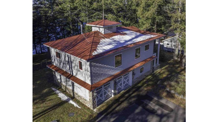7021 Virgin Timber Dr Sugar Camp, WI 54501 by First Weber Inc $579,500