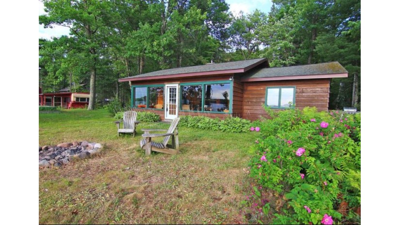 6949 West Wolfe Point Rd Stone Lake, WI 54876 by Edina Realty, Inc. $575,000