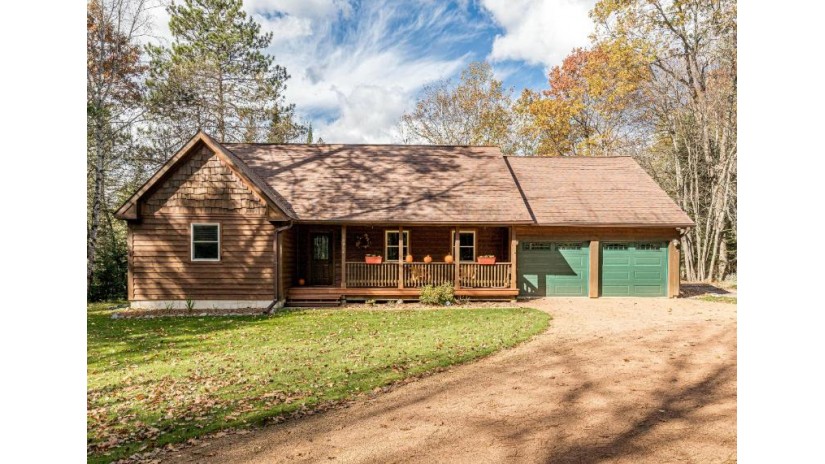 10064 Woodcrest Dr Minocqua, WI 54548 by Redman Realty Group, Llc $309,900