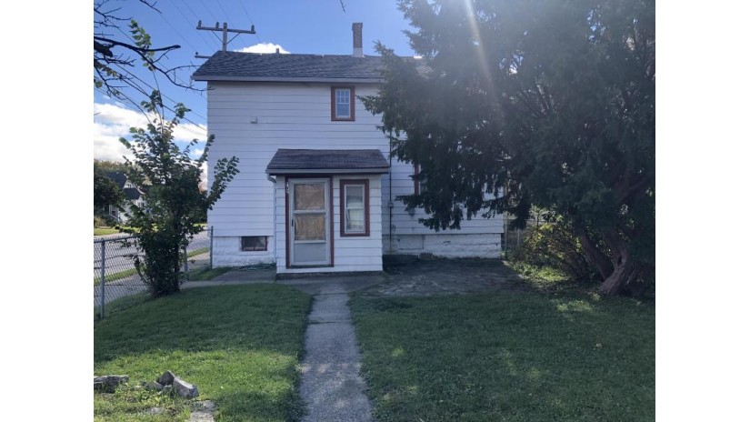 702 W Melvina St Milwaukee, WI 53206-3342 by Realty Among Friends, LLC $79,900