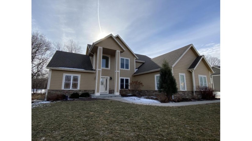 W271N6868 Stonehouse Dr Lisbon, WI 53089 by CAP Investment Realty, LLC $619,900