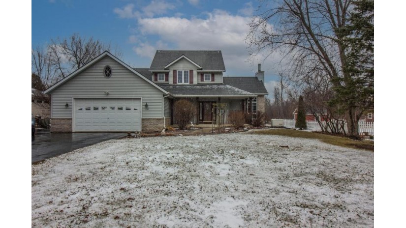 1580 E Paradise Dr West Bend, WI 53095 by Redefined Realty Advisors LLC $409,900