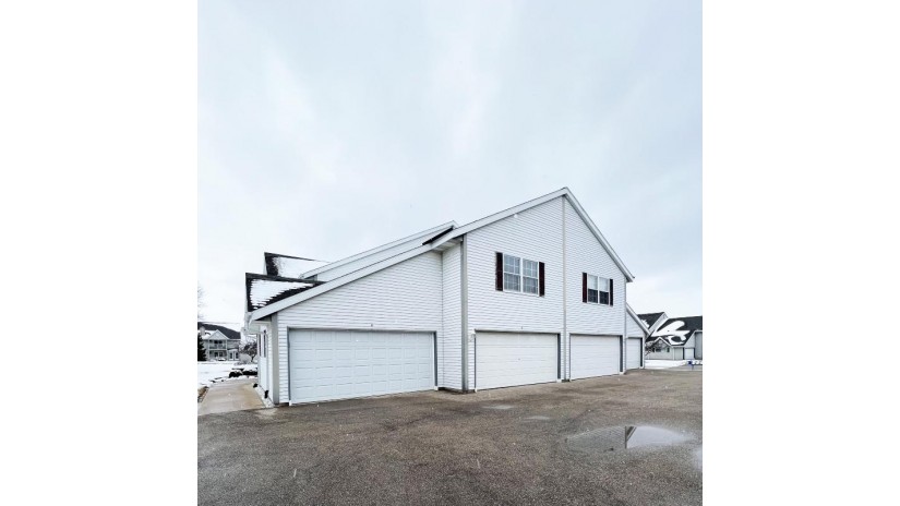 2106 Marie Ct 4 West Bend, WI 53095 by Lannon Stone Realty LLC $218,500