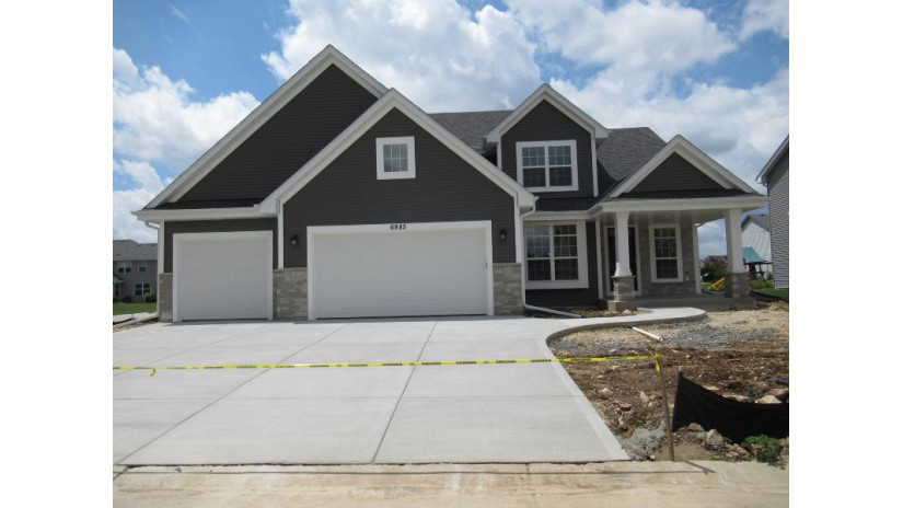 6985 Flagstone Pass Lannon, WI 53046 by Kaerek Homes, Inc. $489,990