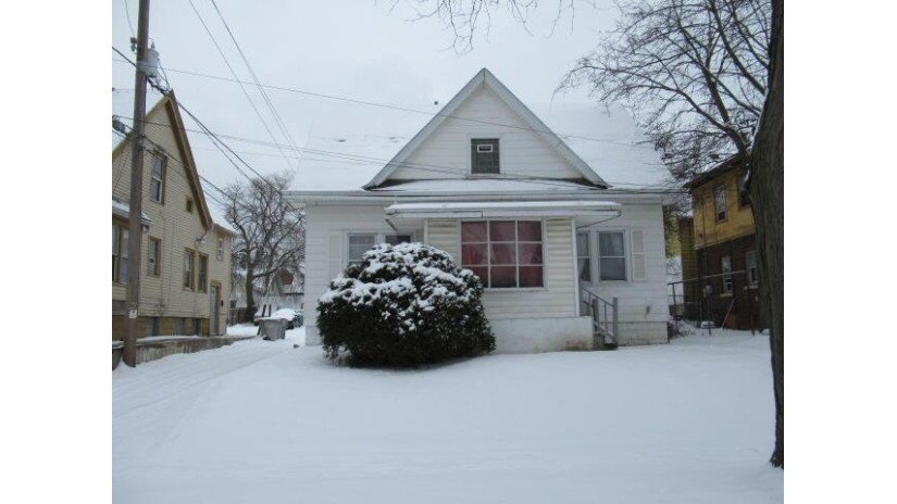 3212 N 24th Pl Milwaukee, WI 53206 by Realty Among Friends, LLC $49,000