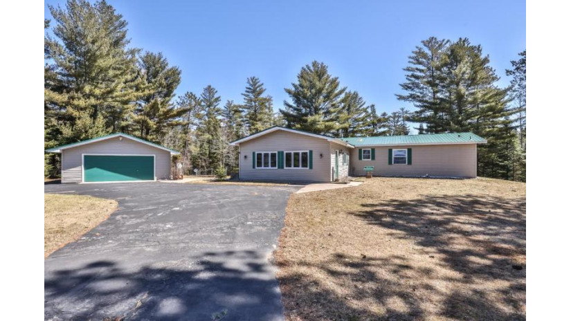 1140 Arnett Rd Arbor Vitae, WI 54568 by Redman Realty Group, Llc $315,000