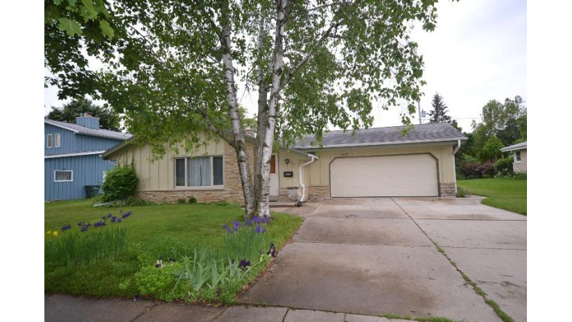 5112 Russell Dr Greendale, WI 53129 by Cherry Home Realty, LLC $270,000