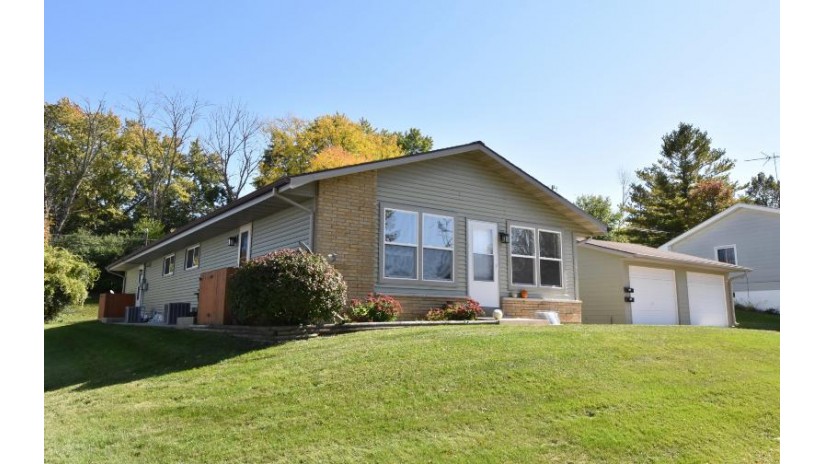 1411 Victoria Dr 1413 Waukesha, WI 53189 by Homestead Realty, Inc $374,900