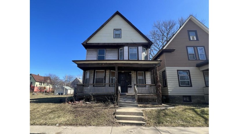 2464 N 27th St Milwaukee, WI 53210 by Premier Point Realty LLC $49,900