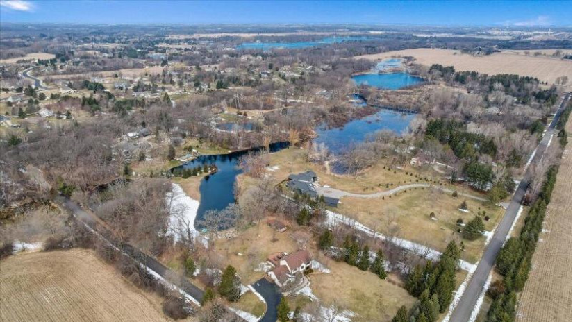 200 N Summit Moors Dr Summit, WI 53066 by The Real Estate Center, A Wisconsin LLC $725,000