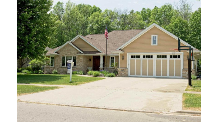 1199 Folkestone Drive Howard, WI 54313 by Coldwell Banker Real Estate Group $599,900