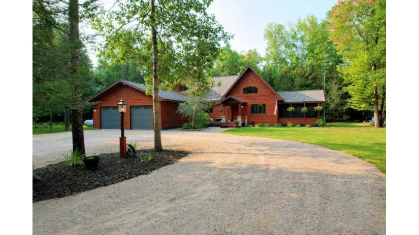 6091 Knuth Ln Eagle River, WI 54521 by Eliason Realty - Eagle River $585,000