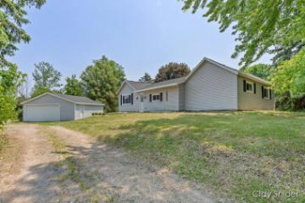 10451 Tasker Road Lake Odessa, MI 48849