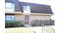 6109 W Calumet Rd Milwaukee, WI 53223 by Homestead Realty, Inc $99,900